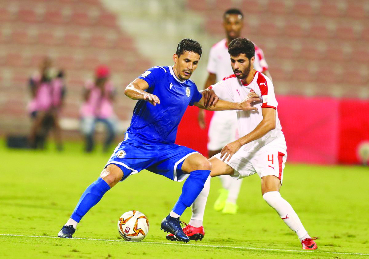 Action from the Ooredoo Cup Group B match between Al Khor and Al Arabi at the Al Arabi Stadium yesterday.