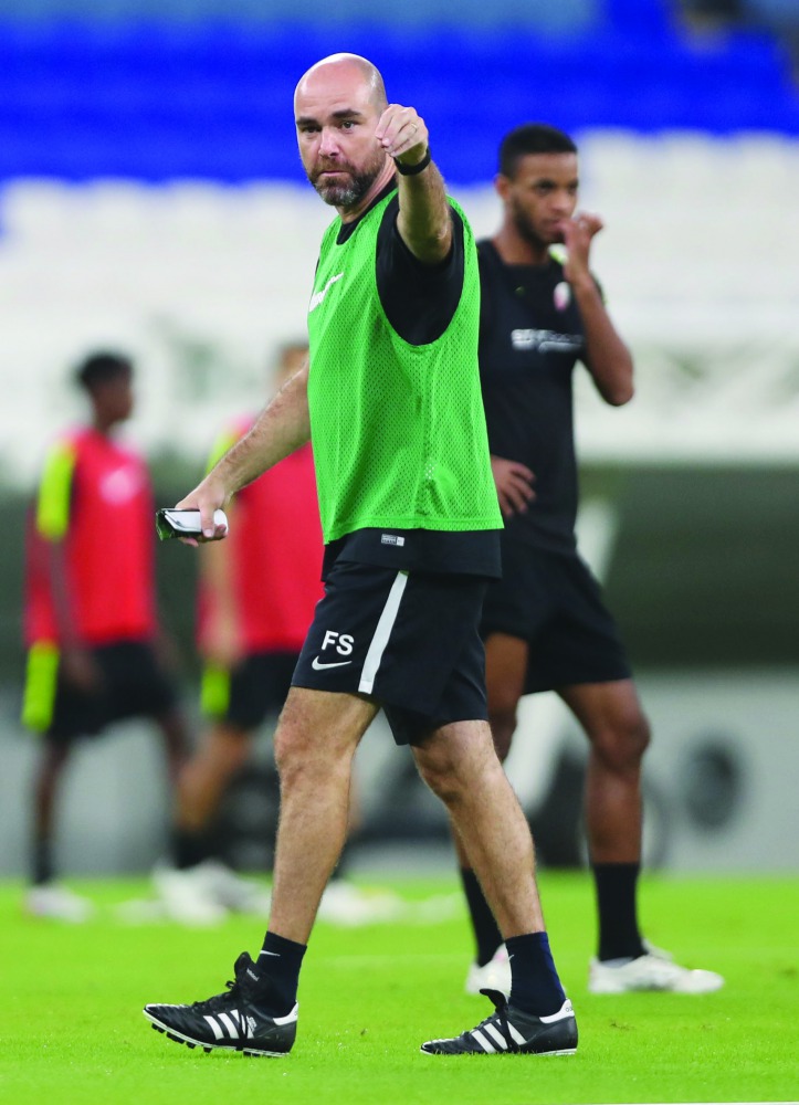 Qatar’s head coach Felix Sanchez gestures during a training session yesterday.