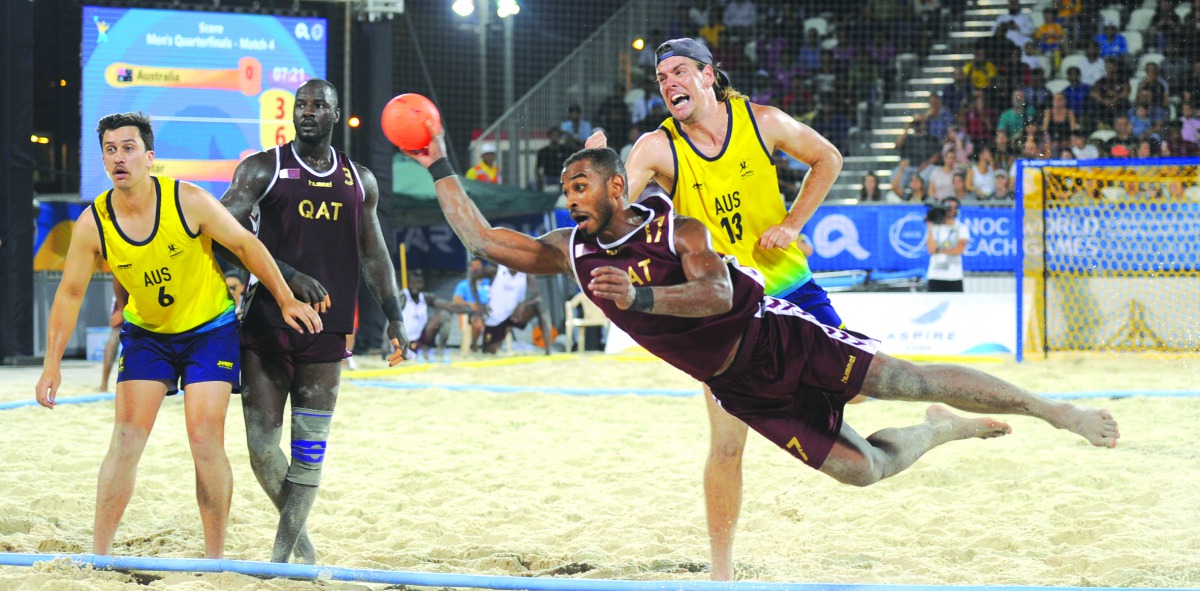 Qatar’s Mohamed Mutasem prepares to score against Australia during their beach handball quarter-final match at Al Gharafa, yesterday. Picture: Anvar Sadath 
