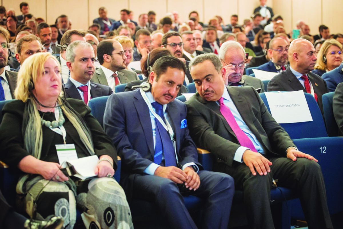 The Minister of Commerce and Industry, H E Ali bin Ahmed Al Kuwari (right), and Qatar Chamber Chairman Sheikh Khalifa bin Jassim Al Thani (centre) attending the Arab-Italian Business Forum in Milan, Italy. 