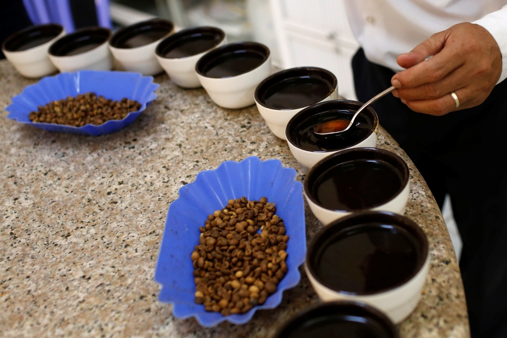 Coffee is being tasted at Simexco Dak Lak Limited coffee company in the town of Di An in Binh Duong province, Vietnam July 8, 2019. Reuters/  Yen Duong