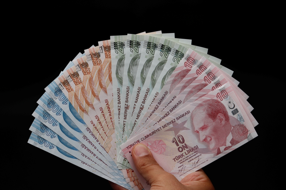 Turkish lira banknotes are seen in this picture illustration in Istanbul, August 14, 2018. Reuters / Murad Sezer