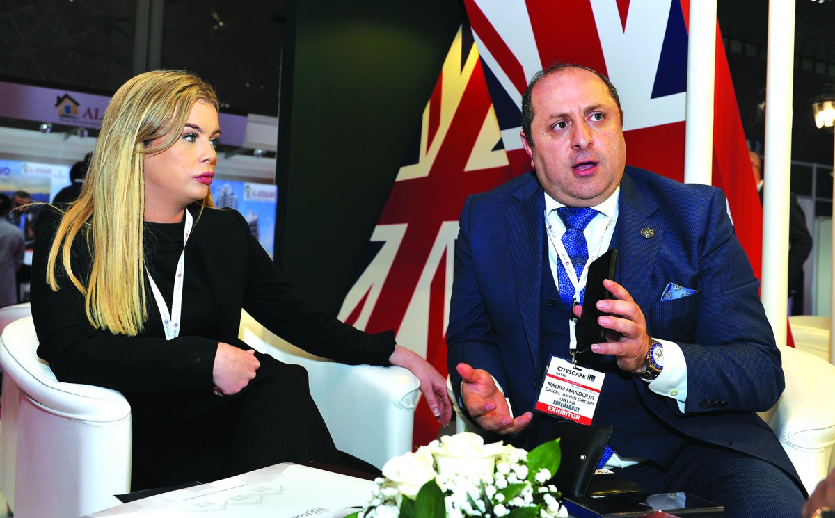Nadim Mansour (right), Managing Director at Daniel Johns Group-Qatar; and Danielle McMahon, International Sales & Marketing Manager for the UK-based Group, speaking to The Peninsula at the company’s pavilion at Cityscape Qatar 2019 expo at the DECC.  Pict