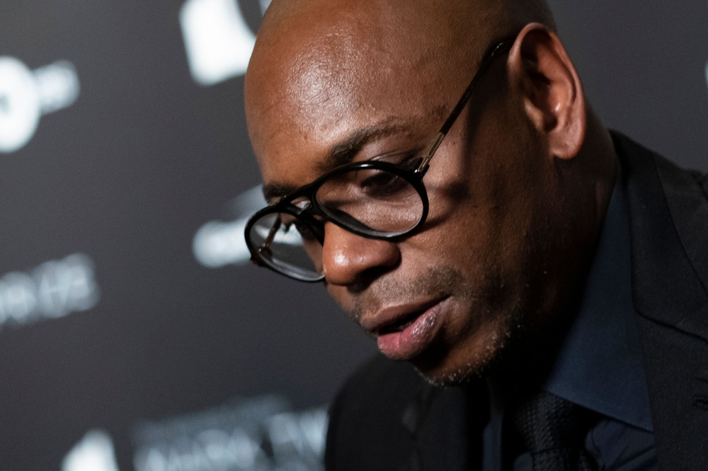 US comedian Dave Chappelle and recipient of the Mark Twain Award for American Humor arrives at the Kennedy Center for award ceremony on October 27, 2019 in Washington. AFP / Alex Edelman
