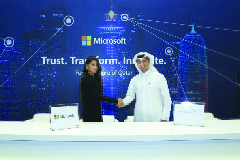Yousef Al Naama (right), CEO at malomatia; with Lana Khalaf, Country Manager of Microsoft Qatar, announcing their partnership agreement at QITCOM 2019 yesterday. 