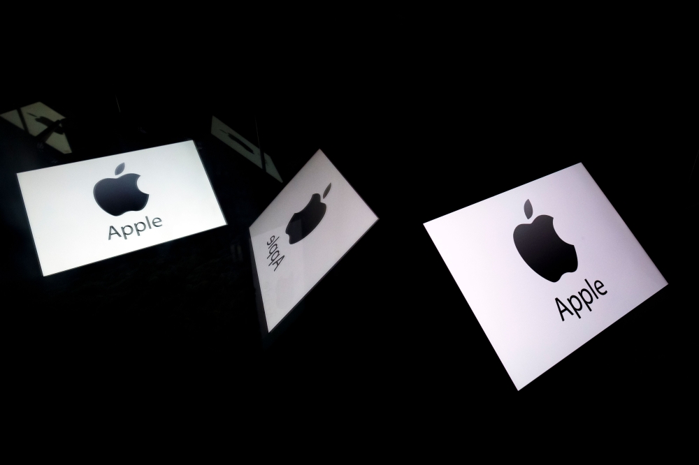 In this illustration picture taken on February 16, 2019, shows the Apple logo displayed on a tablet in Paris. AFP / Lionel Bonaventure