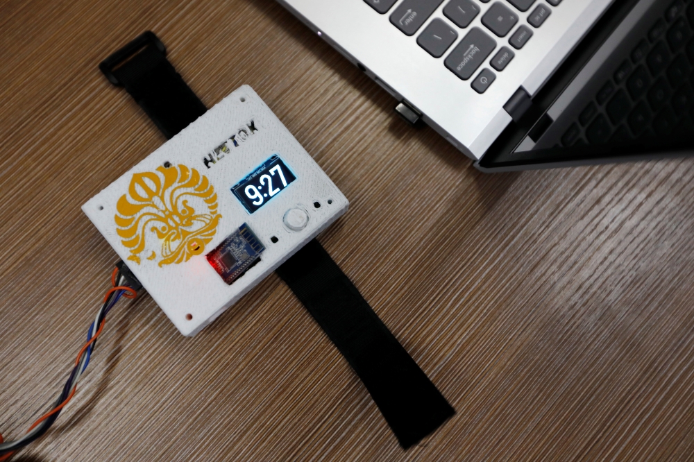 Nettox, a wristband device invented by Indonesian students to alert people about the time they spent being sedentary, is pictured on a table during a test at a university in Depok near Jakarta, Indonesia, October 16, 2019. Picture taken October 16, 2019. 