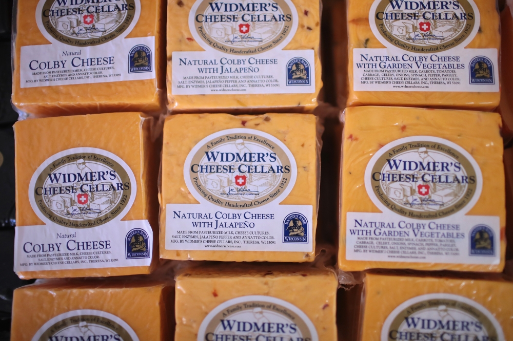 In this file photo taken on June 27, 2016 Colby cheese packages are offered for sale at Widmer's Cheese Cellars in Theresa Wisconsin. AFP / Getty Images North America / Scott Olson