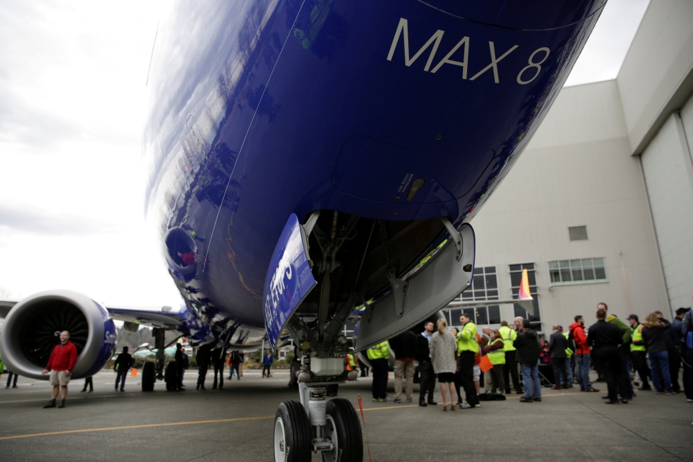 Boeing employees in front of a 737 MAX 8 produced for Southwest Airlines as Boeing celebrates the 10000th 737 to come off the production line in Renton, Washington, March 13, 2018. Reuters / Jason Redmond