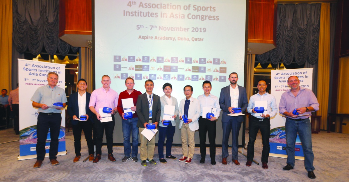 The guest speakers, sponsors and partners at the 4th ASIA Congress posing for a photograph.