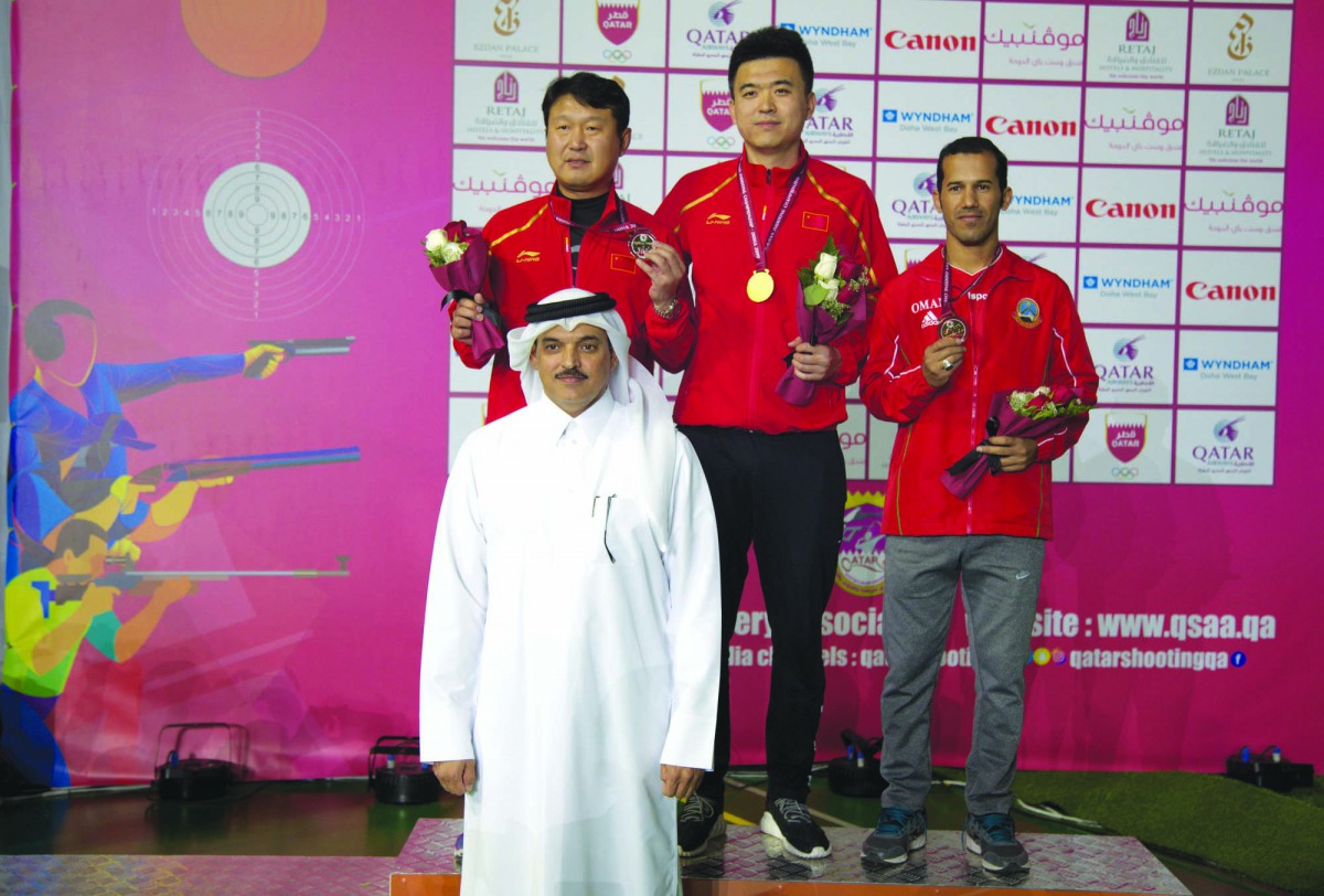 The podium winners in the men’s individual double trap event at the 14th Asian Shooting Championships pose for a picture with Ali Mohamed Al Kuwari, President of Qatar Shooting and Archery Association. Picture: Ebrahim Kutty