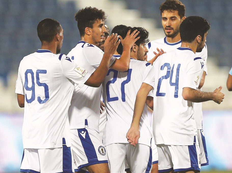 Al Khor’s players celebrate their huge win over Al Duhail.