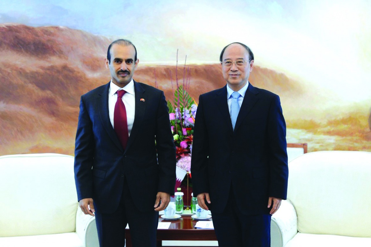 H E Saad Sherida Al Kaabi (left), the Minister of State for Energy Affairs, with Dai Houliang, the Chairman of China Petroleum & Chemical Corporation (Sinopec), in Beijing.