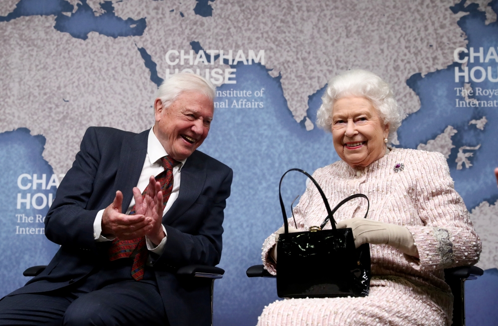 David Attenborough sits next to Britain's Queen Elizabeth during the annual Chatham House award in London, Britain November 20, 2019. Reuters/Simon Dawson