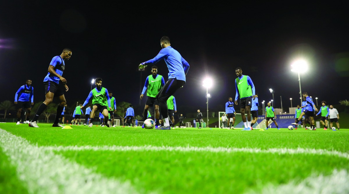Qatari players take part in a training session at Aspire Zone in Doha yesterday as they gear up for the 24th Arabian Gulf Cup.