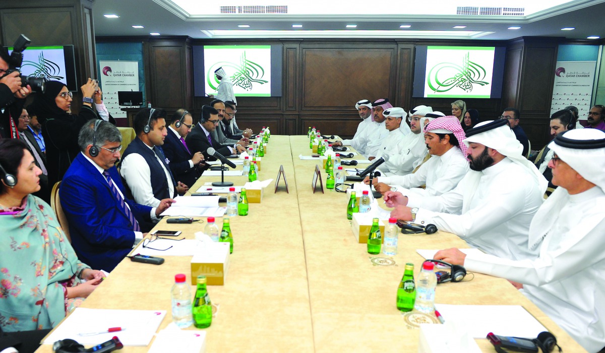 Sayed Zulfikar Abbas Bukhari (third left), Minister of State and Special Assistant to the Prime Minister on Overseas Pakistanis and Human Resource Development, with his delegation during a meeting with Qatari business leaders, who were led by Rashed bin H