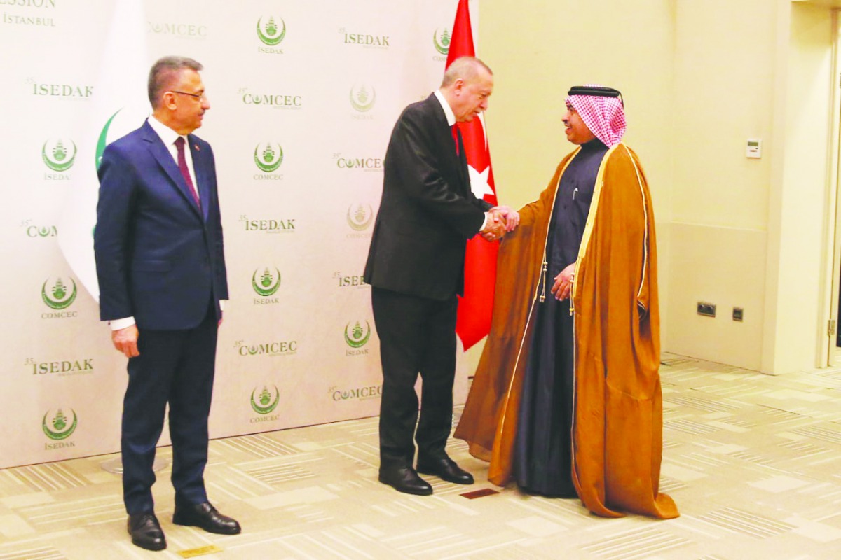 President of the Republic of Turkey, Recep Tayyip Erdogan, receiving H E Ali bin Ahmed Al Kuwari, Minister of Commerce and Industry, during a COMCEC meeting in Istanbul yesterday.