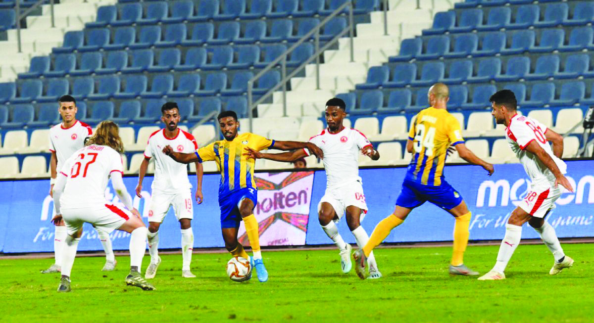 Action during the Ooredoo Cup Group B match between Al Gharafa and Al Arabi yesterday. The match ended in a one-all draw.