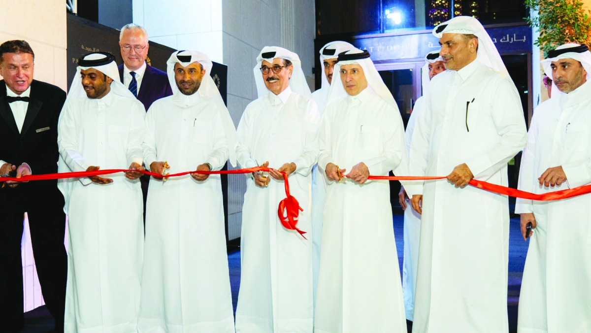 H E Akbar Al Baker (third right), Secretary-General of Qatar National Tourism Council and Board Member of Msheireb Properties, along with other dignitaries, opening the Park Hyatt Hotel in Msheireb Downtown Doha, yesterday.