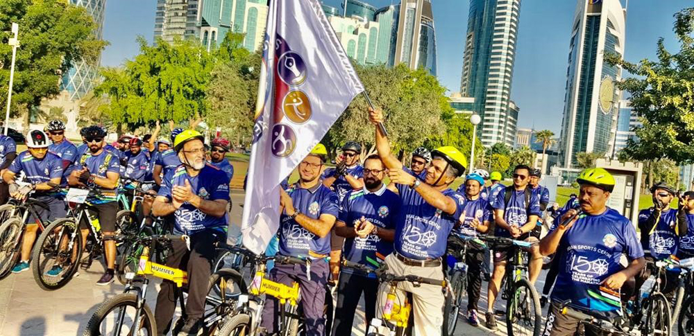 H E Ambassador P Kumaran flags off the cycle rally at Doha Corniche.
