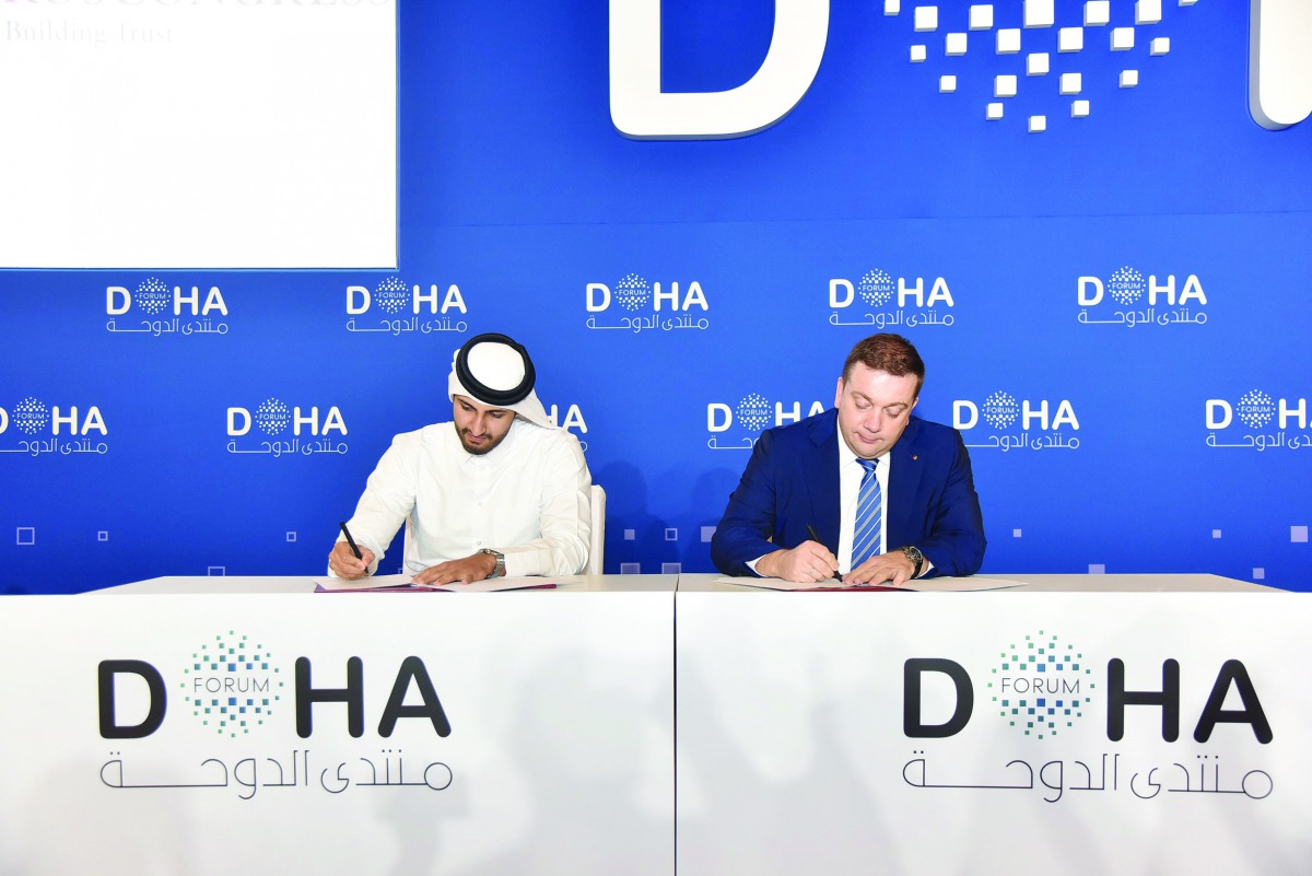  H E Sheikh Ali Alwaleed Al Thani (left), CEO, Investment Promotion Agency of Qatar, signing agreement with Roscongress Foundation.
