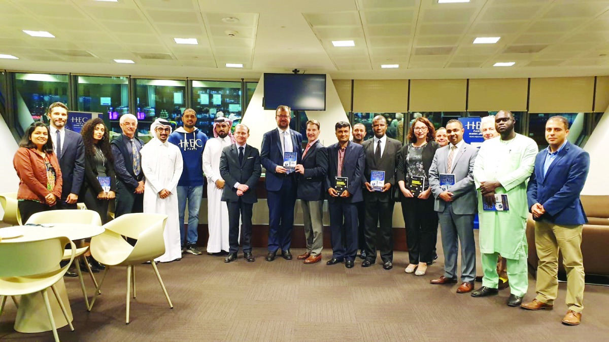 Officials pose for a group picture.