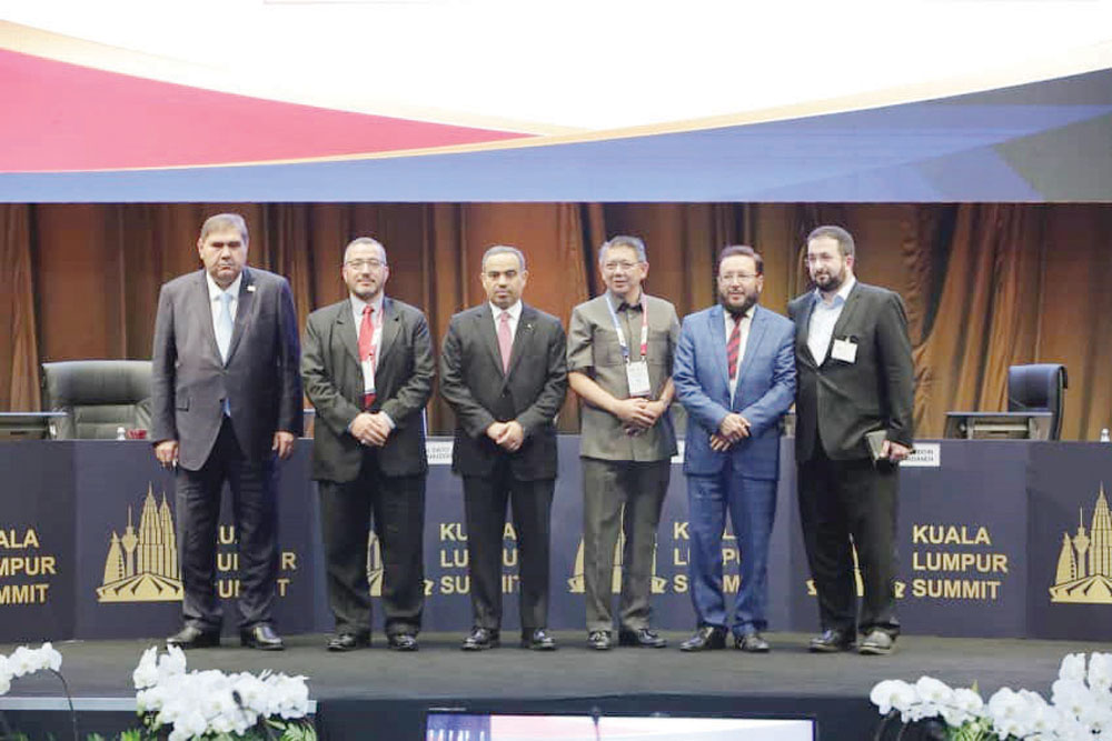 The Minister of Commerce and Industry, H E Ali bin Ahmed Al Kuwari (third left), with other dignitaries during the Kuala Lumpur 2019 Summit which concluded in the Malaysian capital yesterday.