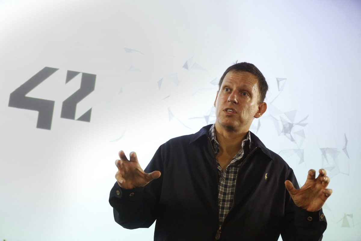 Peter Thiel, the Silicon Valley investor who co-founded PayPal, talks to students during his visi in Paris, February 24. 2016. Reuters / Jacky Naegelen