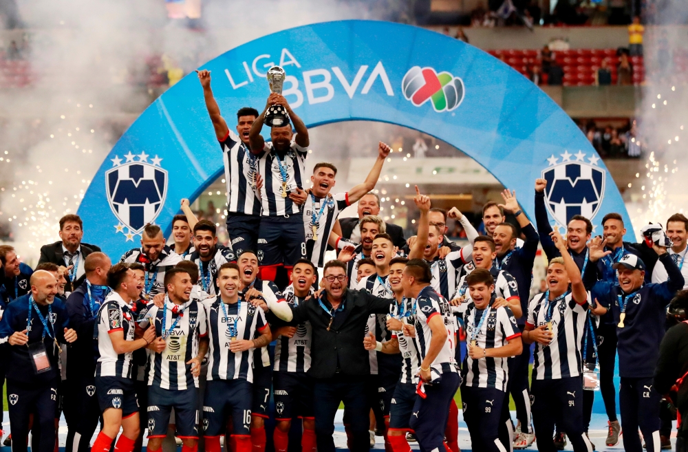 Soccer Football - Liga MX - Final - Second Leg - America v Monterrey - Azteca Stadium, Mexico City, Mexico - December 29, 2019 Monterrey's Dorlan Pabon celebrates with the trophy after winning the Liga MX REUTERS/Henry Romero