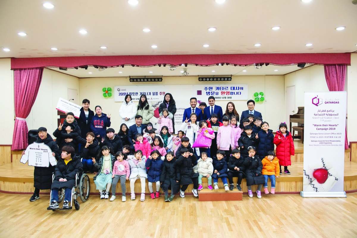 The officials and children during the winter-focused campaign in Seoul, South Korea.
