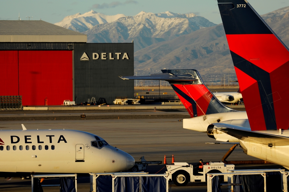 A Delta Air Lines flight is pushed put of its gate at the airport in Salt Lake City, Utah, U.S., January 12, 2018. Reuters/Mike Blake