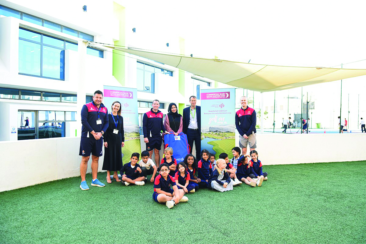 Abeer Marwan Al Kalla, Head of Corporate Communications and CSR; and ECGC golf professionals with local school students.