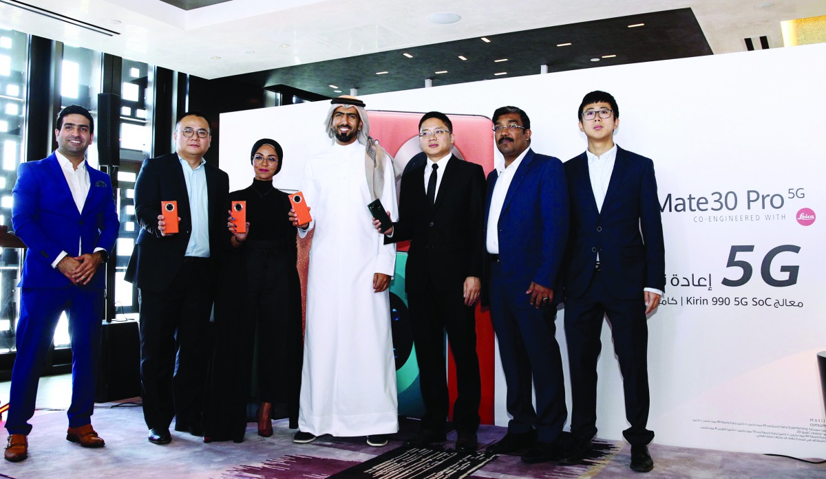 Farihan Adam (third left), Marketing & PR Manager, Huawei Middle East, and other officials during the Huawei Mate 30 Pro 5G launch event, held at the Park Hyatt Hotel yesterday. Pic: Qassim Rahmatullah / The Peninsula