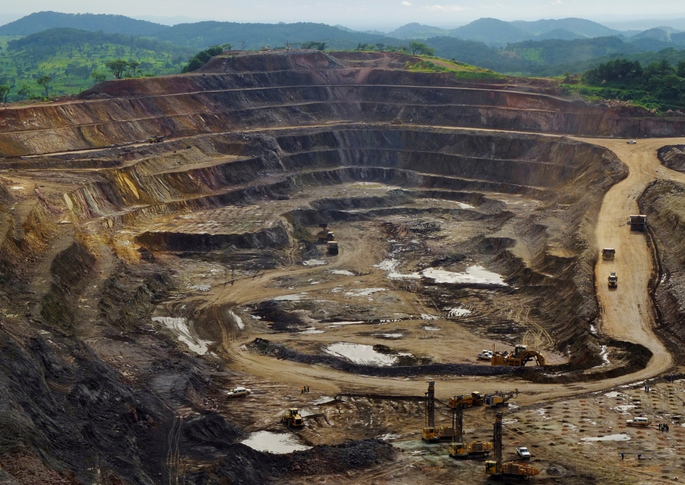 Excavators and drillers at work in an open pit at Tenke Fungurume, a copper and cobalt mine 110 km northwest of Lubumbashi in Congo's copper-producing south, January 29, 2013. Reuters / Jonny Hogg