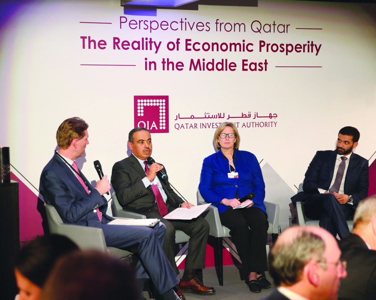 H E Ali bin Ahmed Al Kuwari (second left), Minister of Commerce and Industry,; Hassan Al Thawadi (right), Secretary-General of the Supreme Committee for Delivery and Legacy, and others speaking at the high-level panel discussion organised by the Qatar Inv
