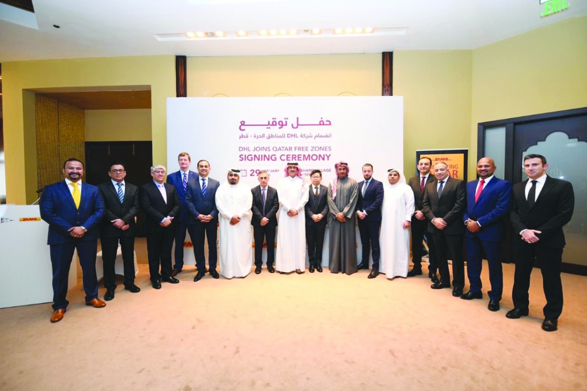 H E Ahmad Al Sayed (centre), Minister of State and Chairman of Qatar Free Zones Authority, and DHL officials during the event.