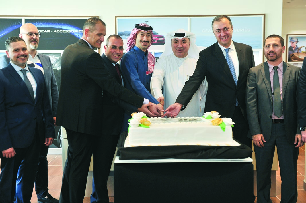 Alfardan Group’s President & CEO, Omar Hussain Alfardan (third right), Samer Bou Dargham (fifth right), General Manager at Alfardan Premier Motors, with other officials during the opening of Jaguar Land Rover’s 3S centre at the Industrial Area recently. P