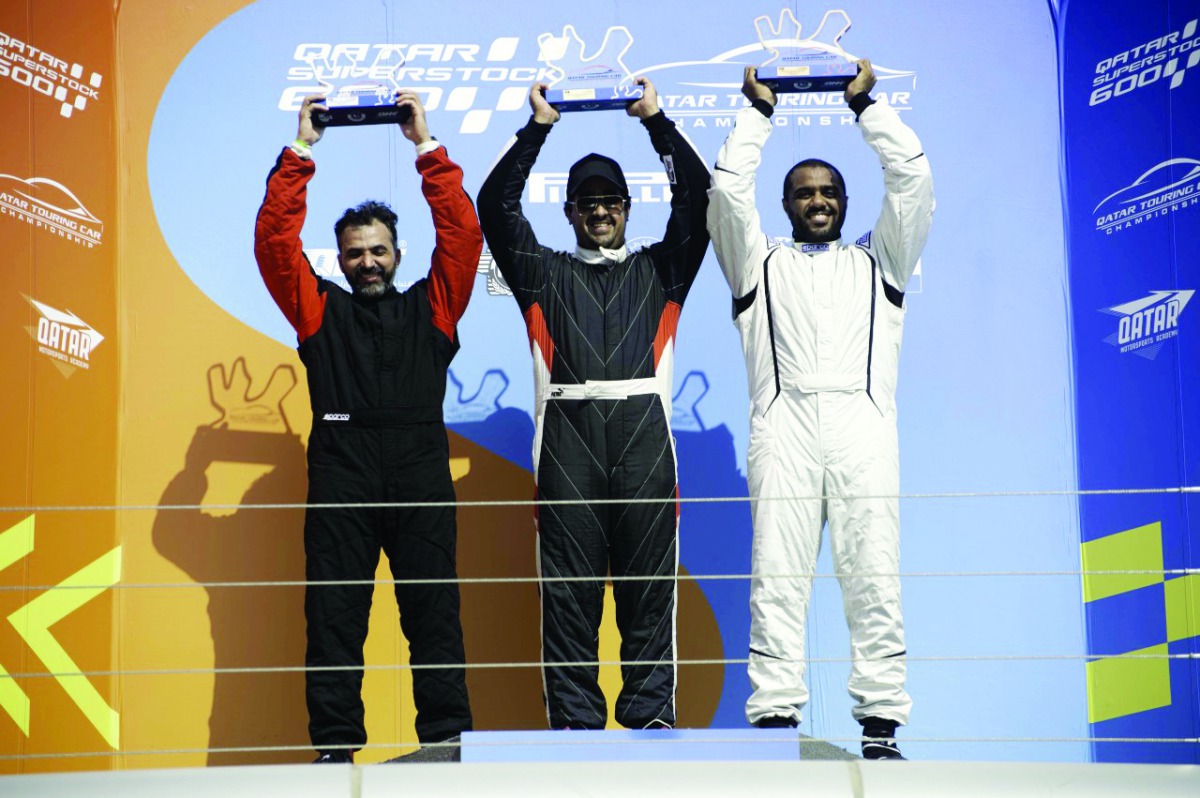 The podium winners at the Qatar Touring Car Championship (QTCC) 2K Race held this weekend at the Losail International Circuit.