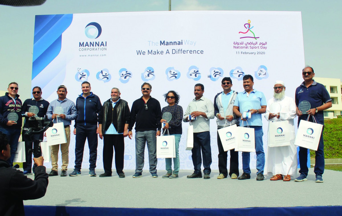 Senior employees of Mannai Corporation during the long-service awards organised during the company's National Sport Day celebrations, yesterday.