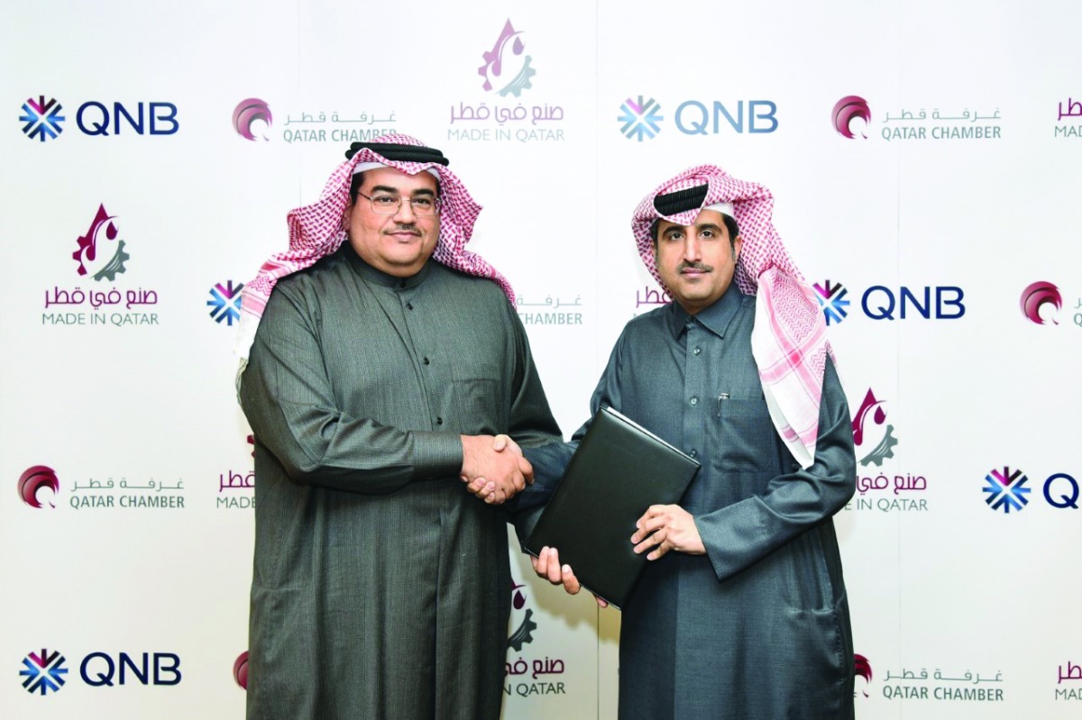 Yousef Ali Darwish (left), General Manager - QNB Group Communications; and Qatar Chamber’s Director-General, Saleh bin Hamad Al Sharqi, during the signing ceremony.