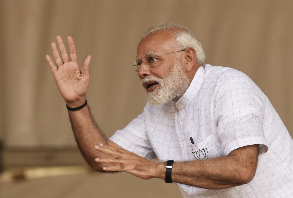 Indian Prime Minister Narendra Modi gestures during a campaign rally ahead of the national elections in Kolkata on April 3, 2019. AFP / Dibyangshu Sarkar