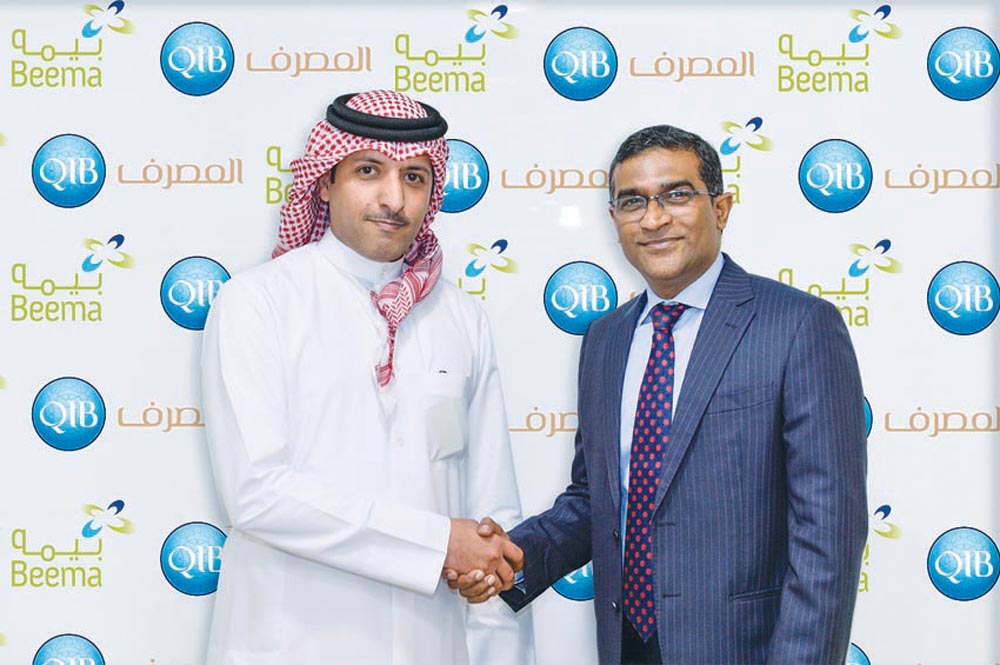 Nasser Al-Misnad (left), CEO, Damaan Islamic Insurance Company, and D. Anand, QIB’s General Manager - Personal Banking Group during the event.