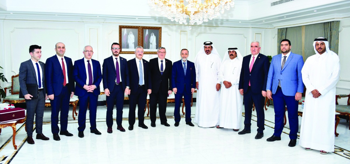 The Chairman of the Turkish-Qatari Parliamentary Friendship Group, MP Vahit Kiler, and other members of the delegation posing for a group picture with the officials of Qatar Chamber, yesterday.  
