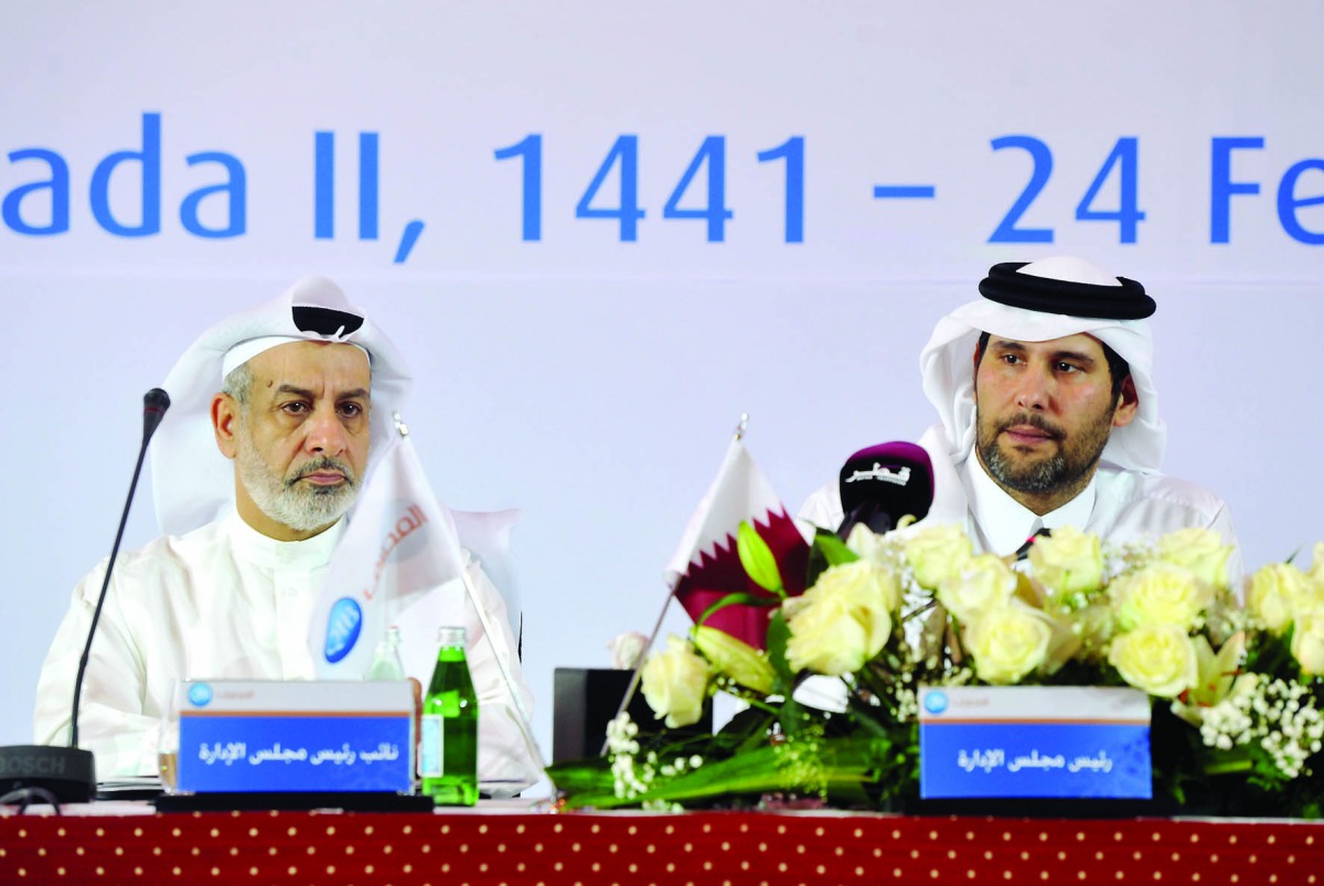 QIB Chairman Sheikh Jassim bin Hamad bin Jassim bin Jaber Al Thani (right) and QIB Vice-Chairman Abdullatif bin Abdulla Al Mahmoud attending the bank’s General Assembly Meeting, yesterday. Pic: Abdul Basit / The Peninsula