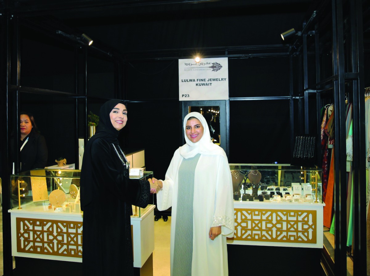 Qatar Chamber’s Board Member and Chairperson of Qatari Businesswomen Forum, Ebtihaj Al Ahmadani (left) greet one of the participants during the event.