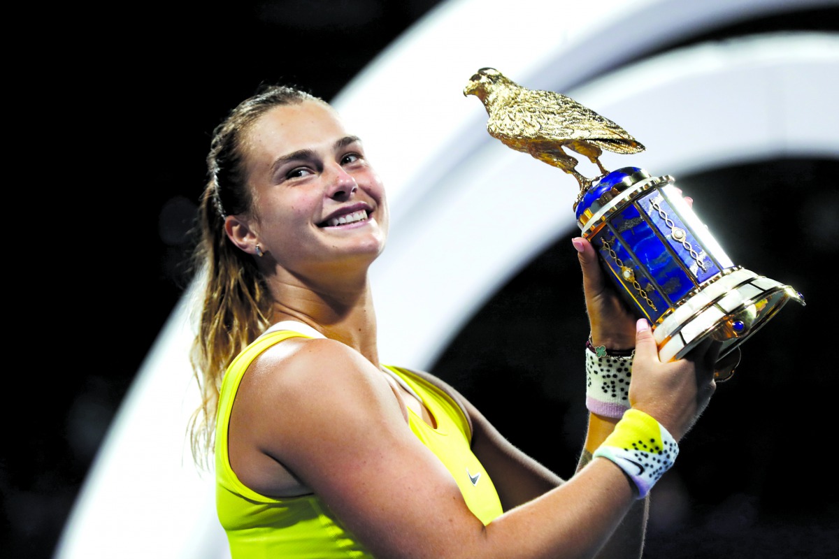 Aryna Sabalenka of Belarus celebrates after winning the WTA Qatar Total Open title at the Khalifa International Tennis and Squash Complex, in Doha, yesterday. 