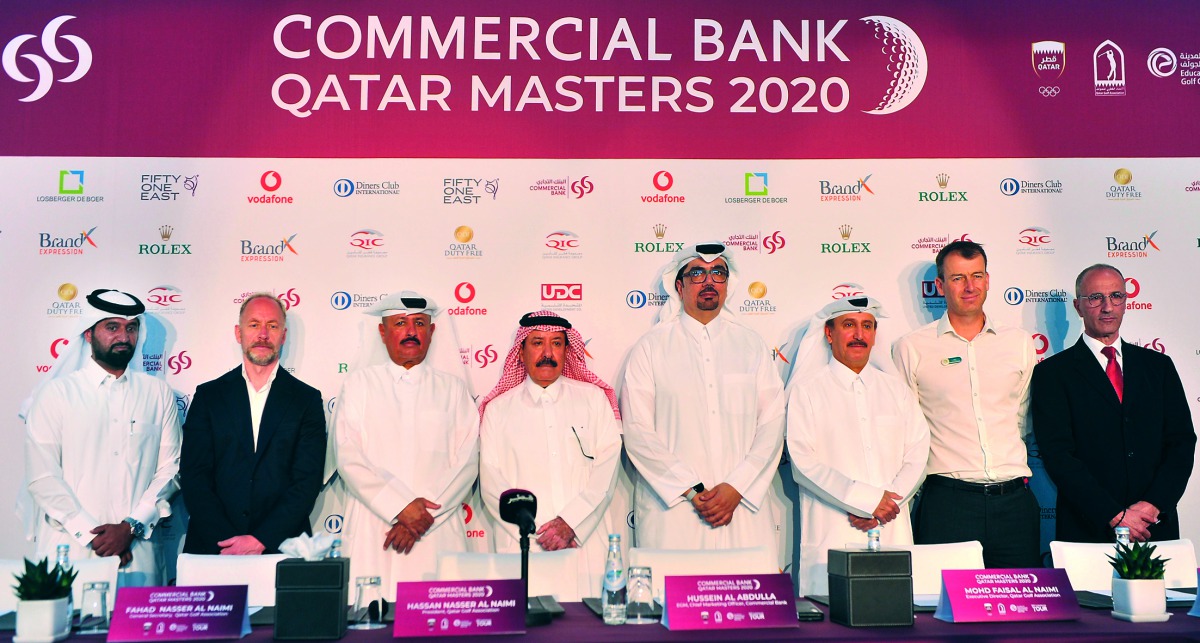 Hassan Nasser Al Naimi (fourth left),  Qatar Golf Association President, and Hussein Ali Al Abdulla (fourth right), Chief Marketing Officer at Commercial Bank posing for a photograph with other top officials during a press conference held at the Education