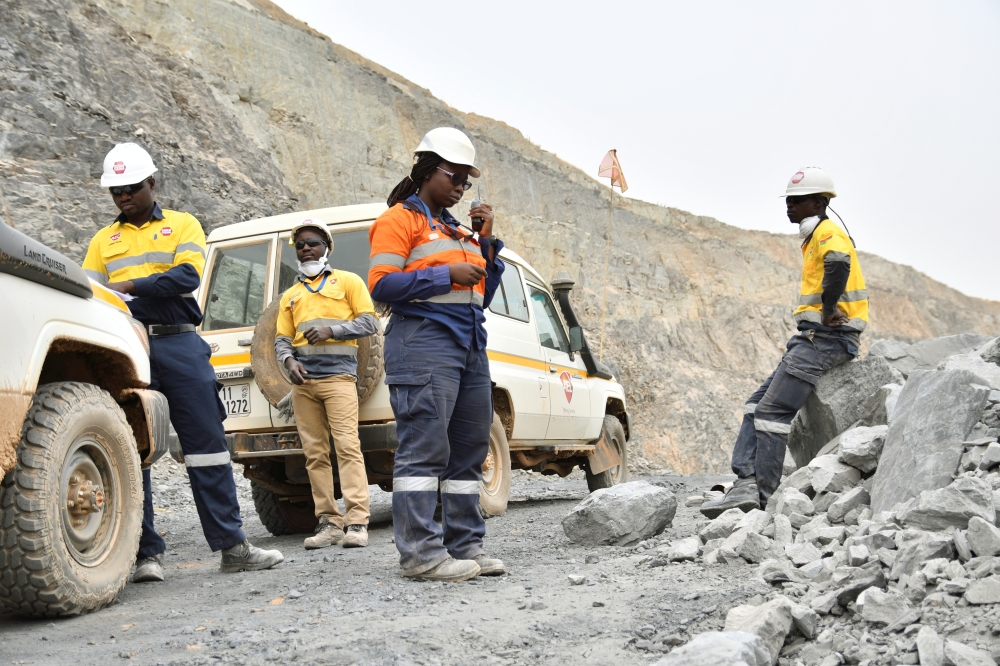 Rosalie Koffi, 31, senior drill and blast engineer, instructs contractors’ team before detonating explosives in the rock at the gold mine site, operated by Endeavour Mining Corporation in Hounde, Burkina Faso February 11, 2020. Reuters/Anne Mimault