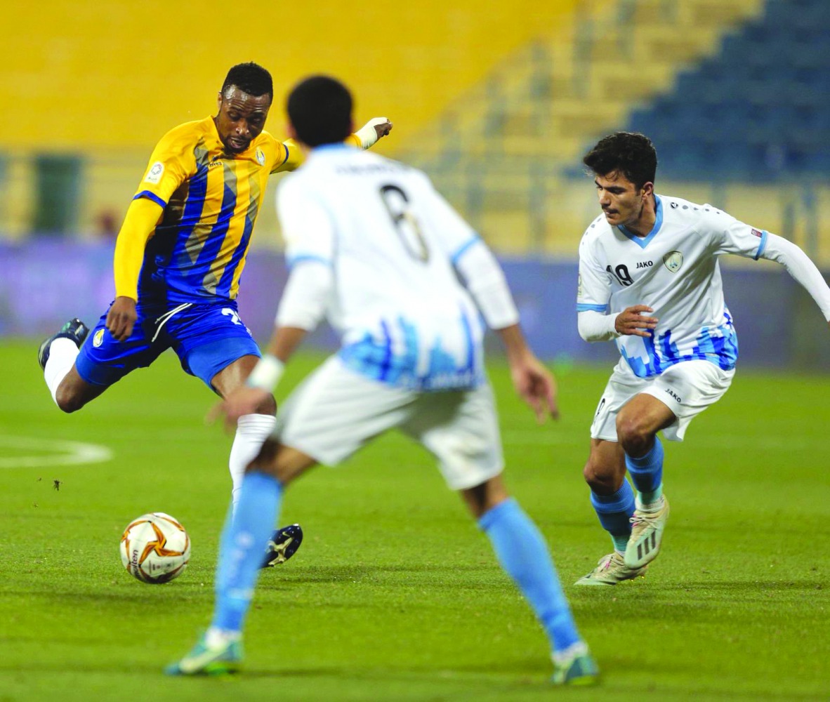 Al Gharafa's Jonathan Kodjia (left) in action yesterday.