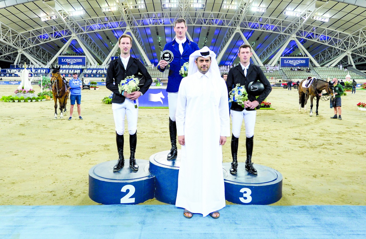 The President of Qatar and Asian Equestrian Federations, Hamad Abdulrahman Al Attiyah posing for a photograph with the podium winners of the feature event at the Longines Arena At Al Shaqab, yesterday.